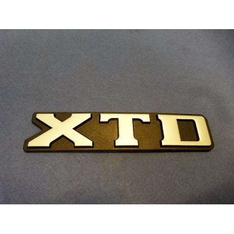 monogramme "XTD"